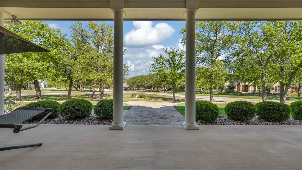 3707 DeCordova Ranch Road Granbury, TX 76049 - Photo 8 of 40 Front porch views! Enjoy peaceful sunrises sipping coffee on the deep covered porch!