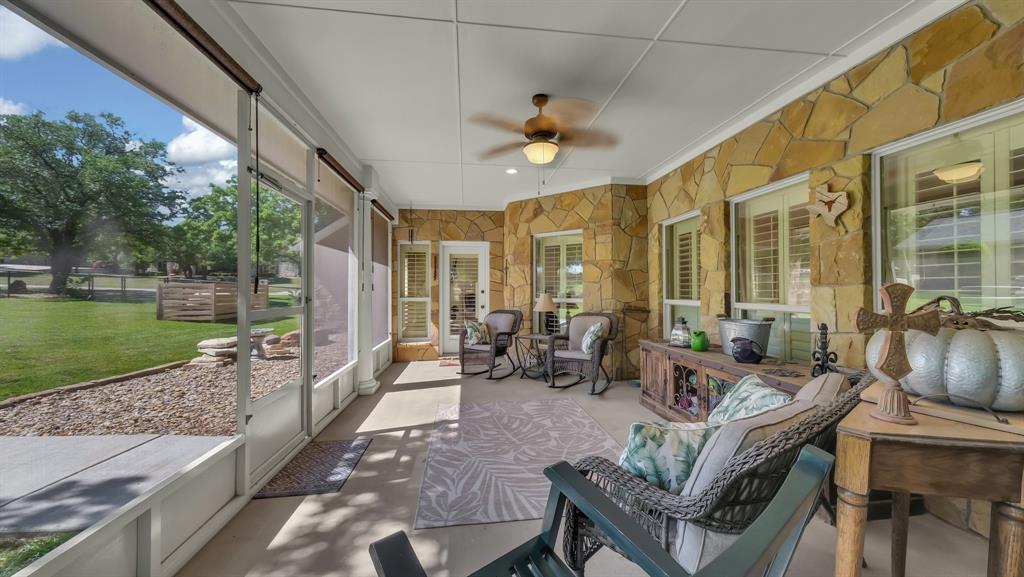3707 DeCordova Ranch Road Granbury, TX 76049 - Photo 9 of 40 Relax on the screened in backporch watching the gorgeous sunsets
