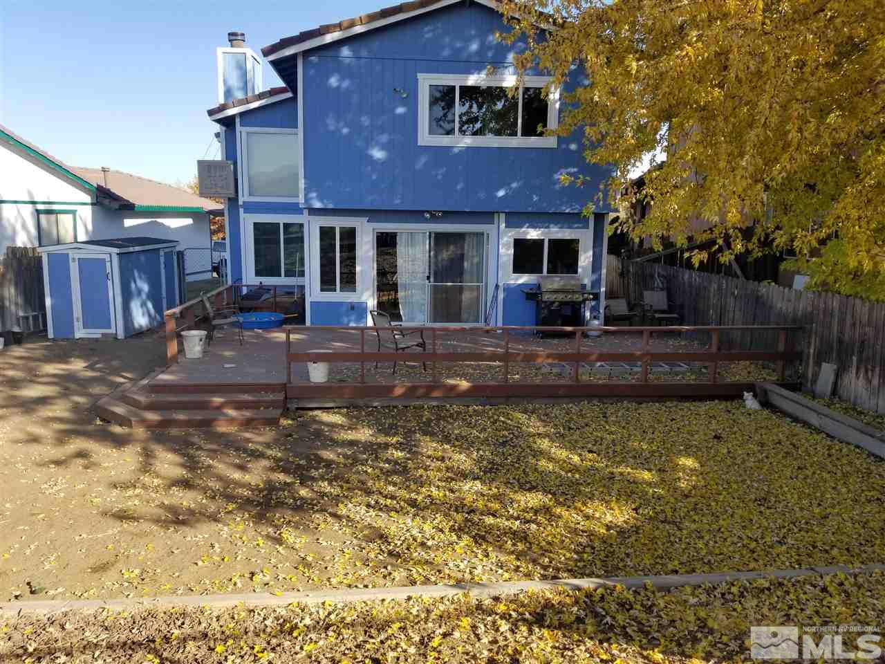7135 Indigo Circle Reno, NV 89506 - Photo 18 of 21 a view of a house with swimming pool in front of it