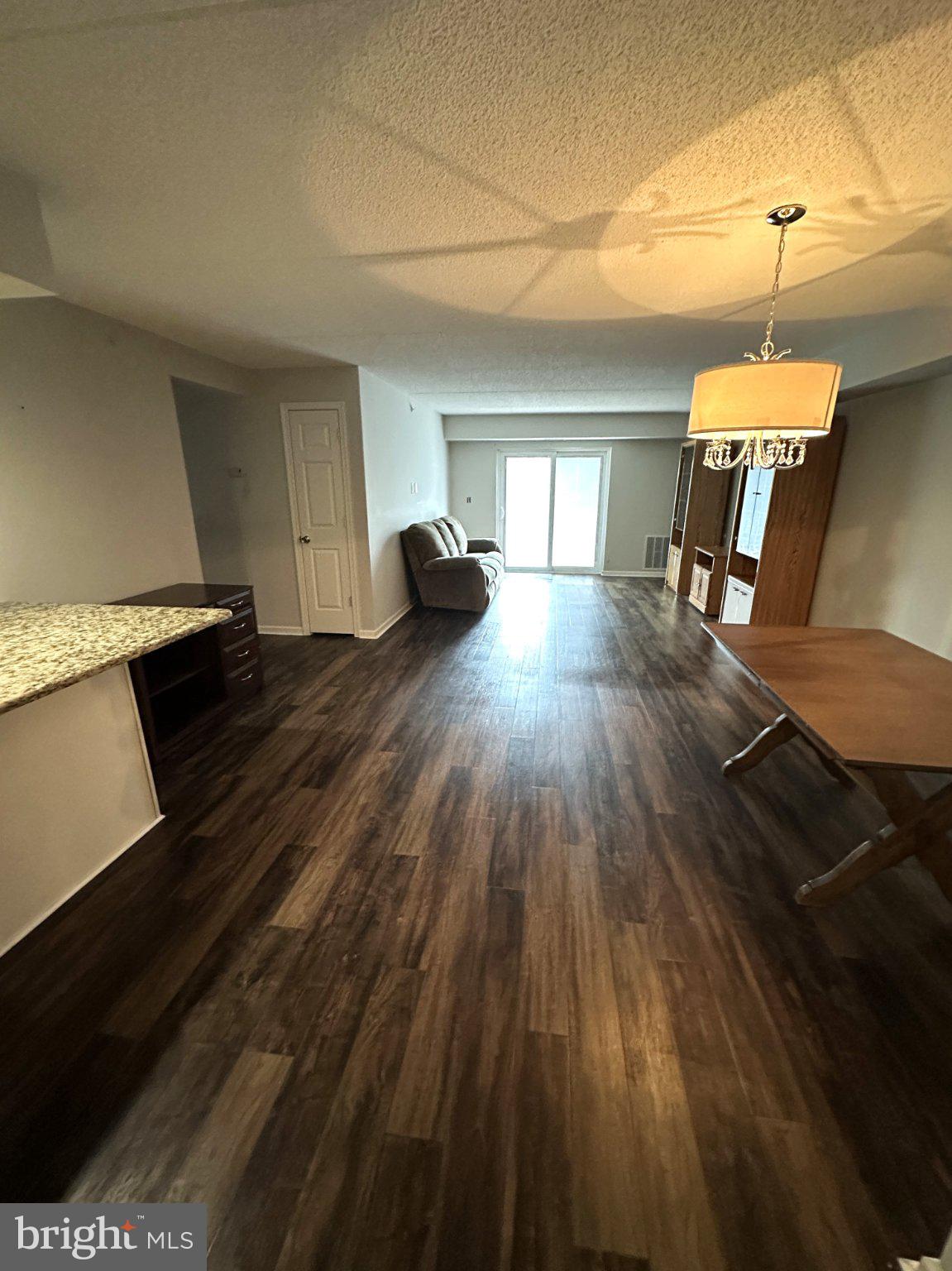613 Brandon Road Norristown, PA 19403 - Photo 14 of 22 a view of a room with wooden floor