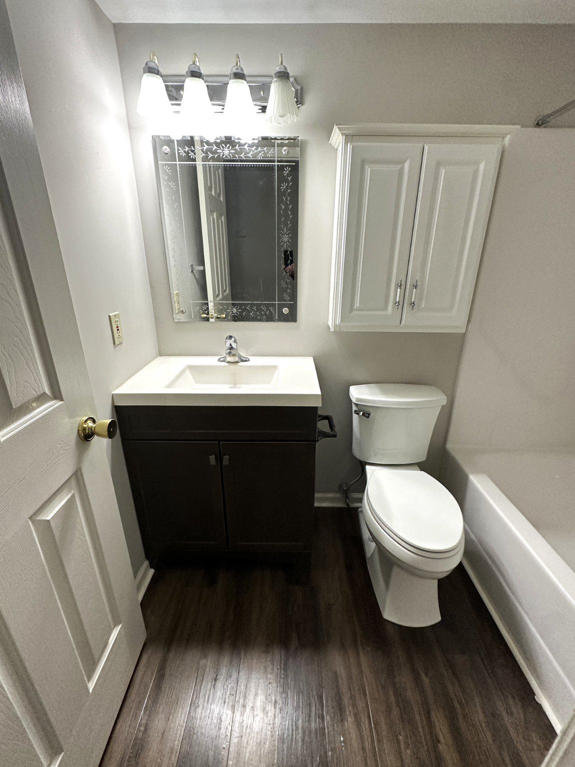 613 Brandon Road Norristown, PA 19403 - Photo 8 of 22 a bathroom with a sink toilet and mirror