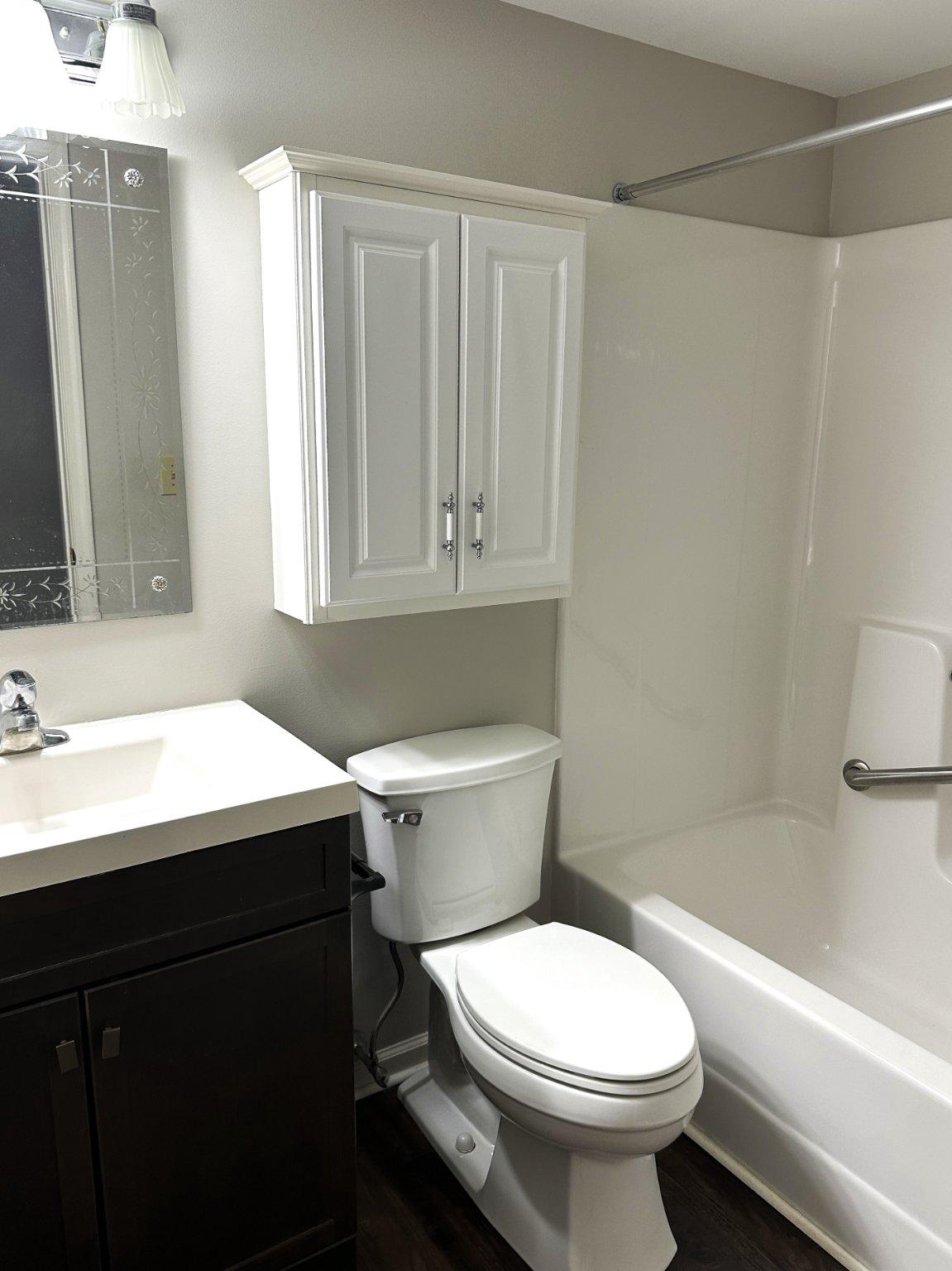 613 Brandon Road Norristown, PA 19403 - Photo 9 of 22 a bathroom with a sink a toilet and shower