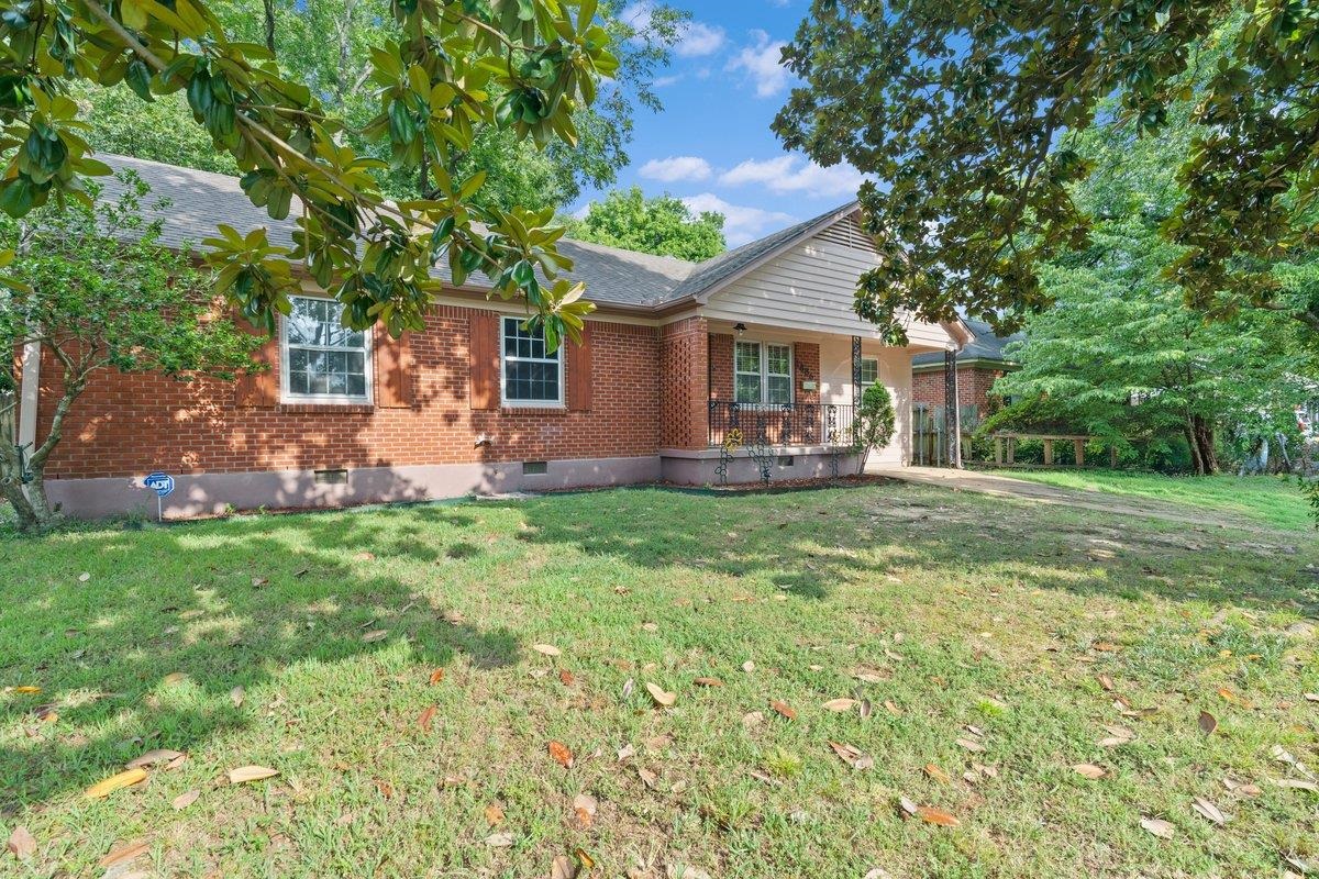 1886 Danville Road Memphis, TN 38117 - Photo 3 of 23 a front view of house with yard and green space