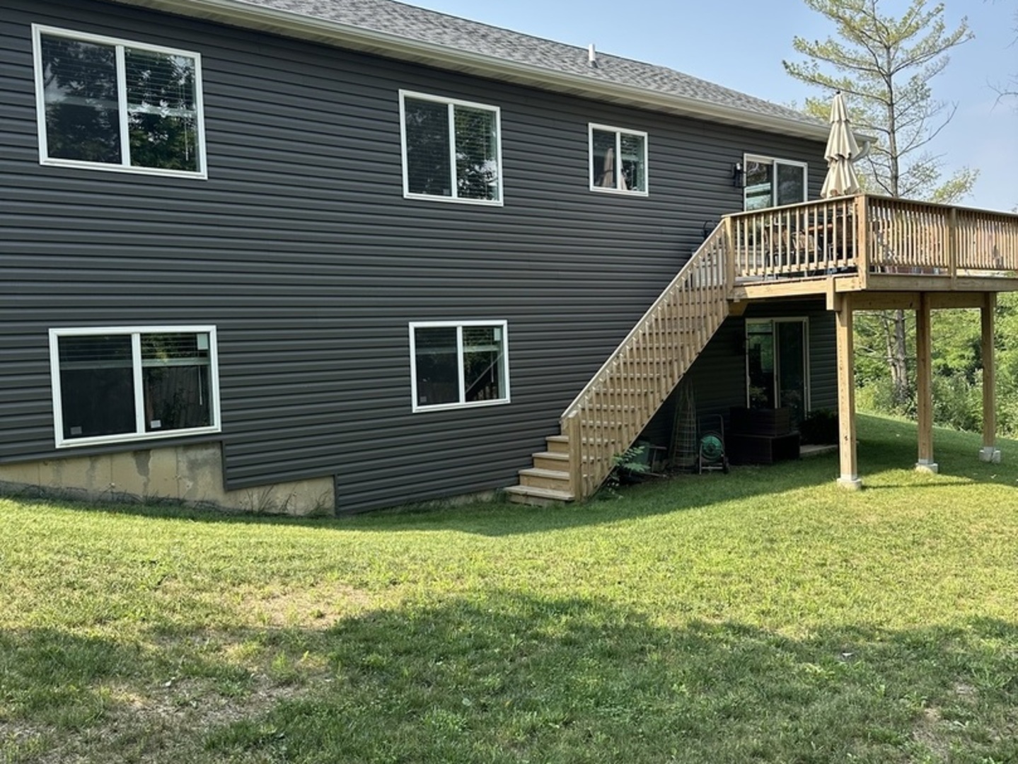 317 Buena Terrace Antioch, IL 60002 - Photo 9 of 10 a view of a house with a yard and stairs