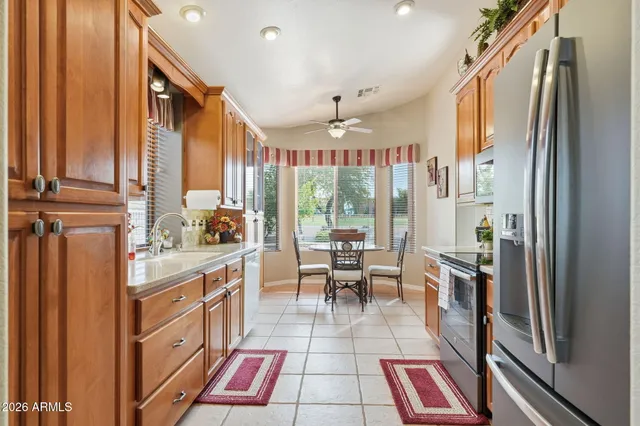 a very nice looking kitchen with a large window