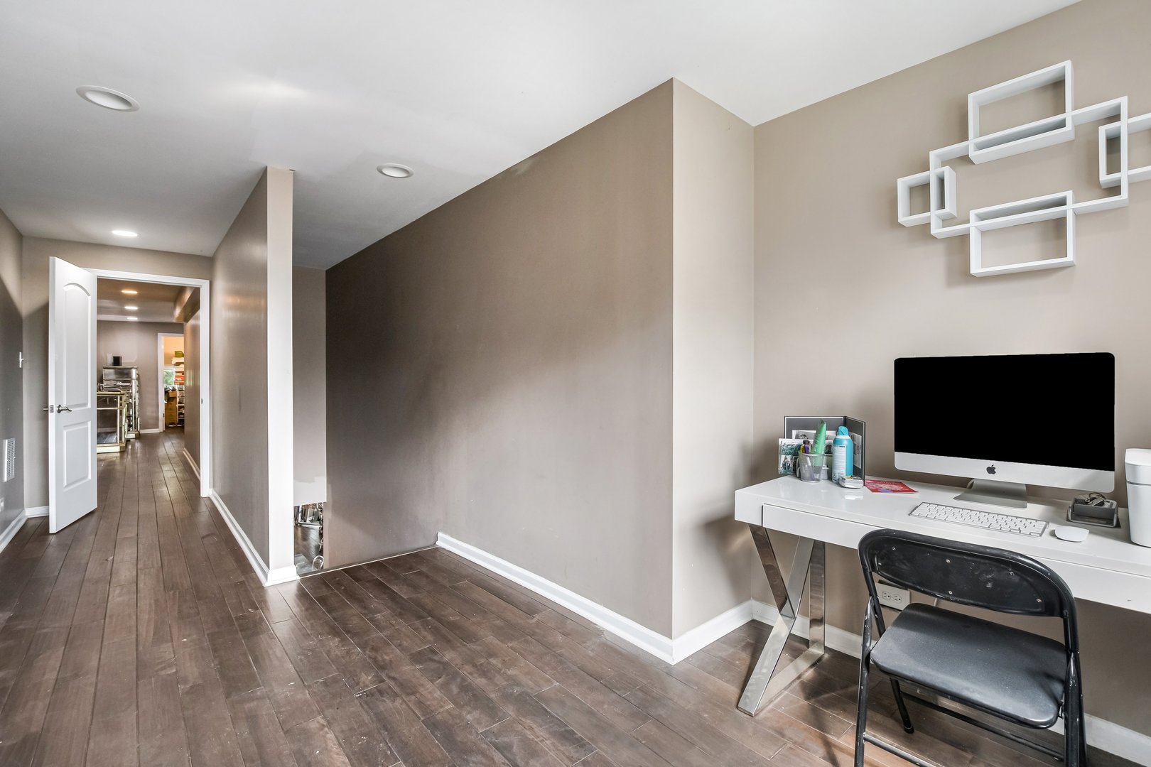 1523 East 85th Street Chicago, IL 60619 - Photo 12 of 27 a workspace with furniture and wooden floor