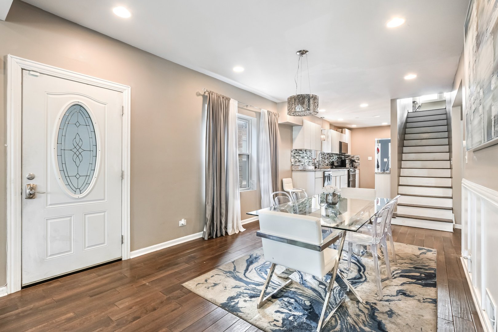 1523 East 85th Street Chicago, IL 60619 - Photo 2 of 27 a living room with furniture and wooden floor