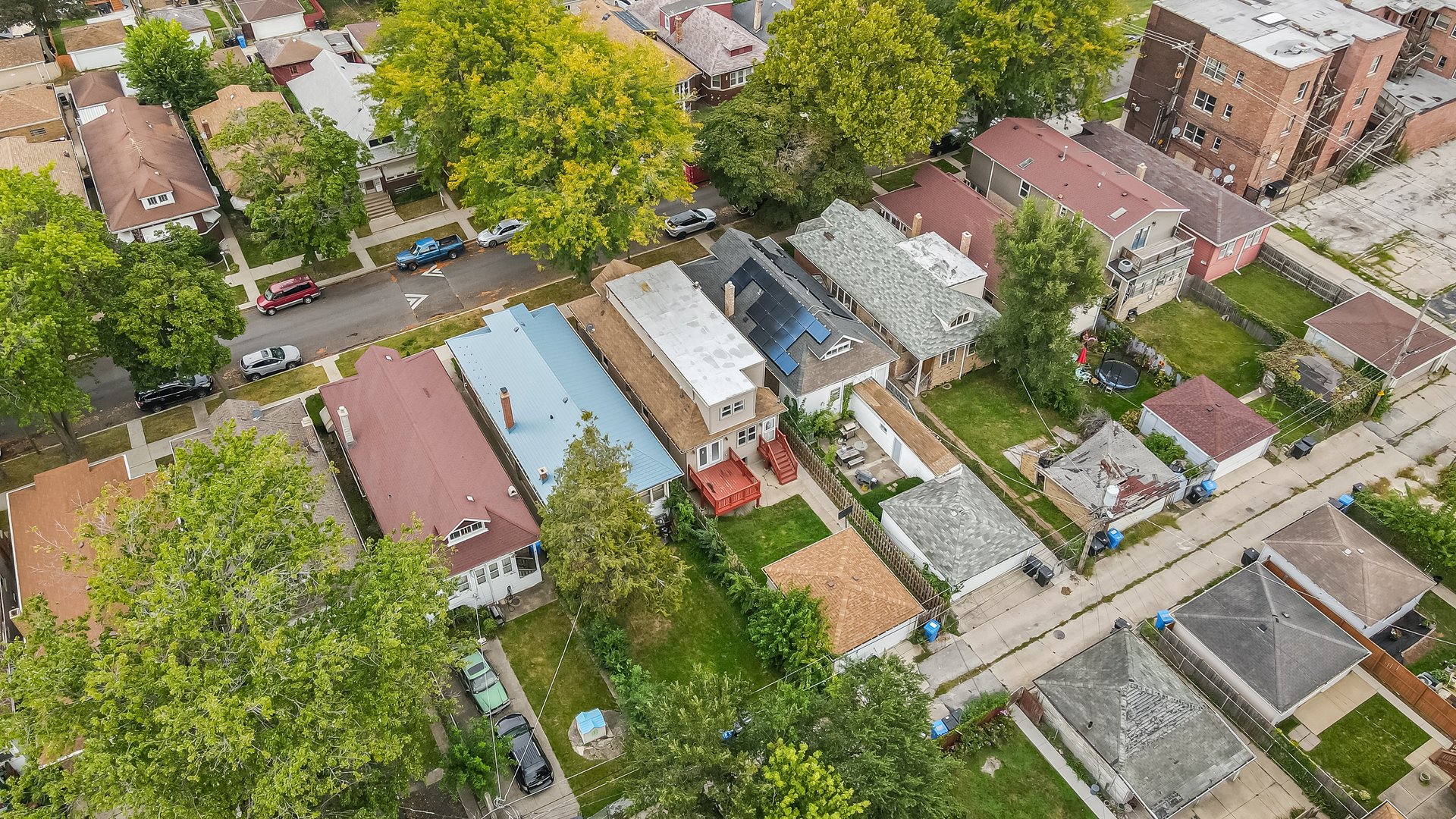 1523 East 85th Street Chicago, IL 60619 - Photo 24 of 27 an aerial view of a house with a garden