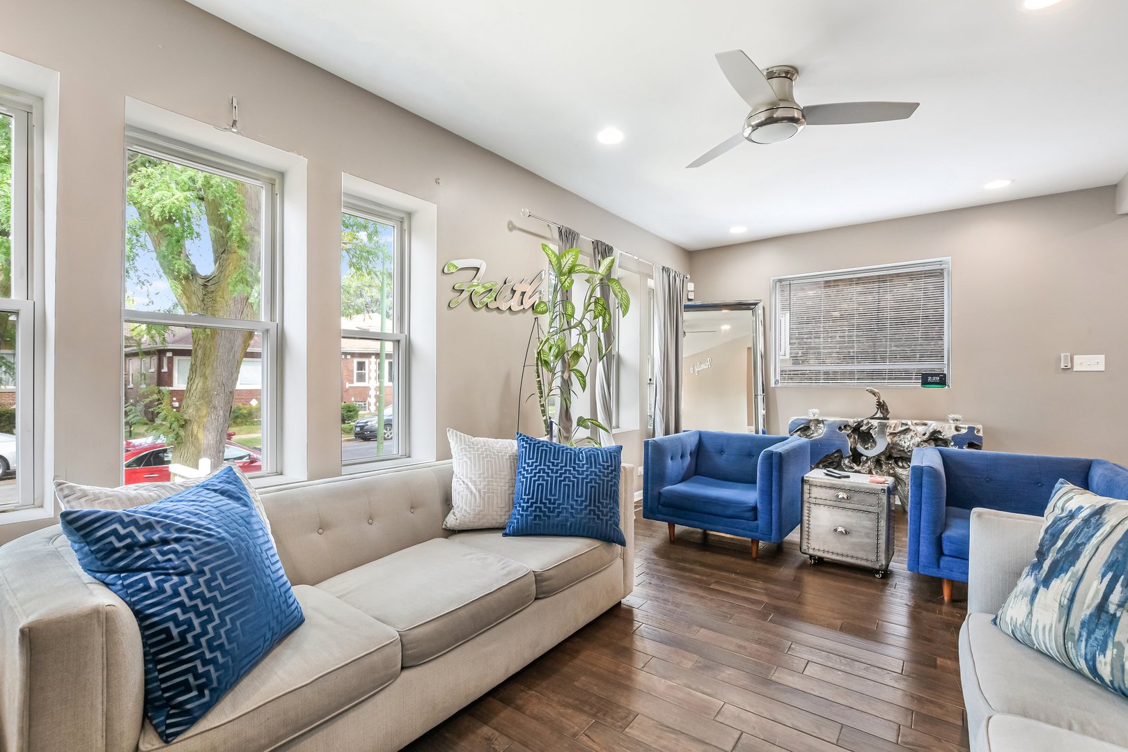 1523 East 85th Street Chicago, IL 60619 - Photo 4 of 27 a living room with furniture and a large window