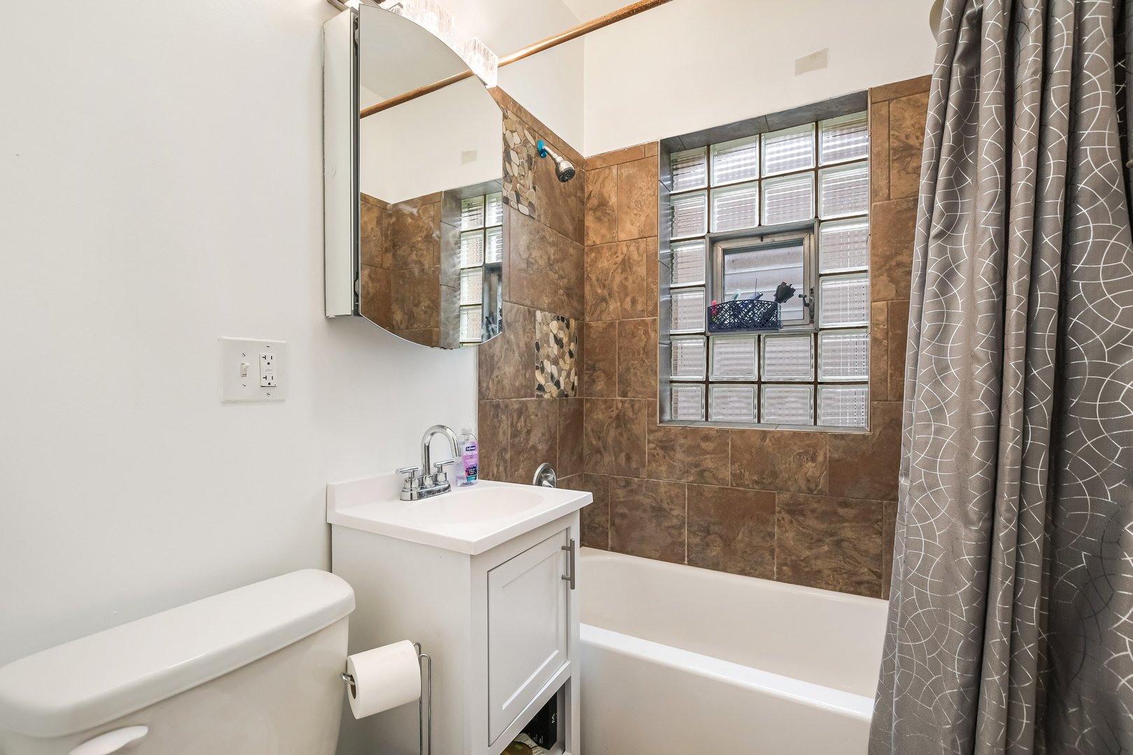 1523 East 85th Street Chicago, IL 60619 - Photo 10 of 27 a bathroom with a sink toilet and shower