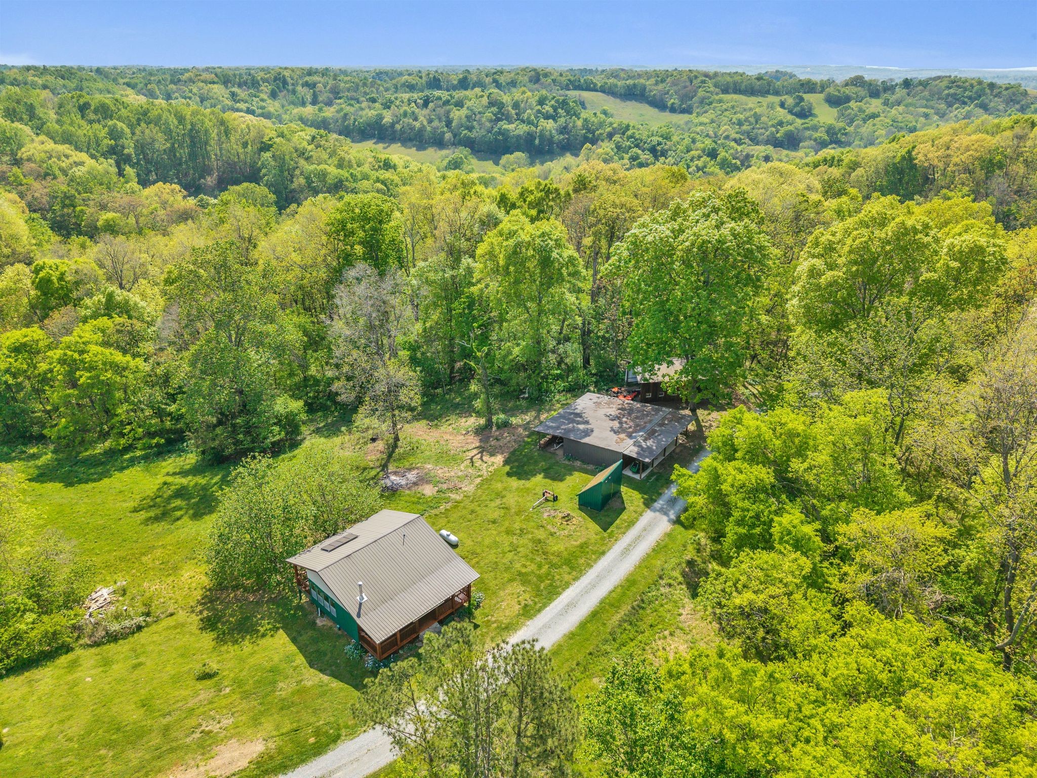 39 Fayetteville Road Kelso, TN 37348 - Photo 67 of 75 a view of a yard with table and chairs