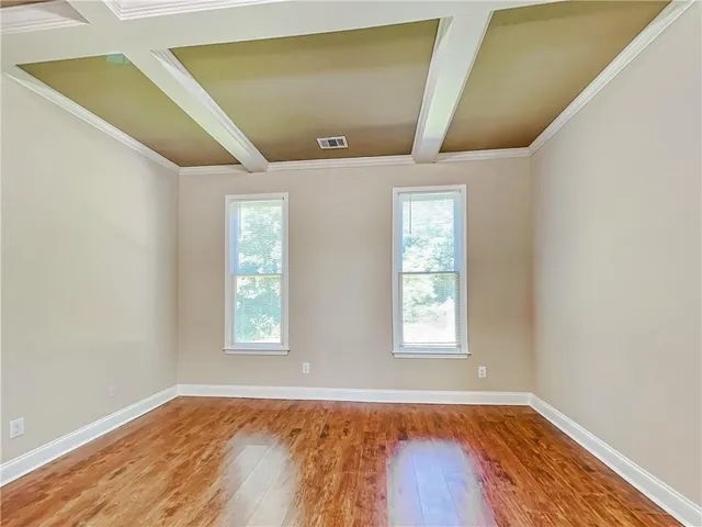 a view of an empty room and window