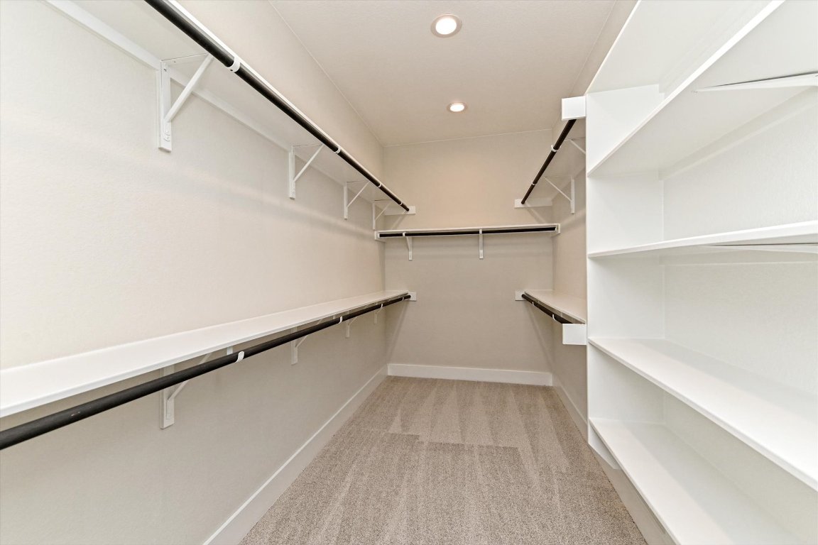 1221 Stormy Drive Georgetown, TX 78628 - Photo 20 of 33 a view of hallway with stairs and wooden floor