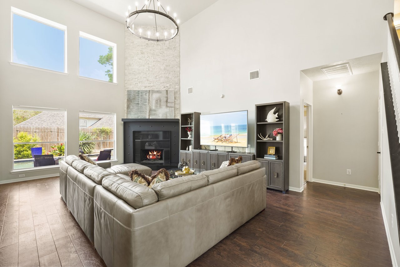 8615 Discus Drive Humble, TX 77346 - Photo 17 of 50 a living room with furniture and a fireplace