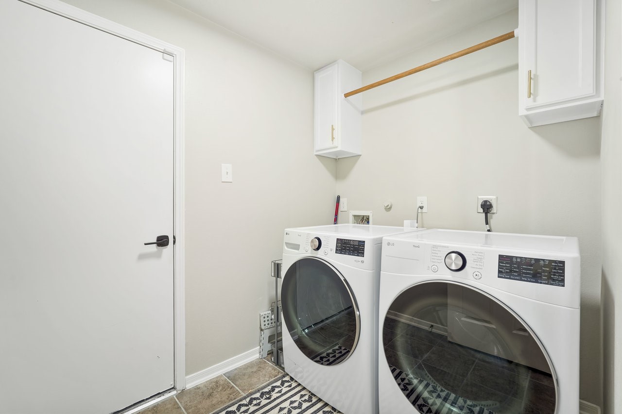 8615 Discus Drive Humble, TX 77346 - Photo 23 of 50 a utility room with dryer and washer