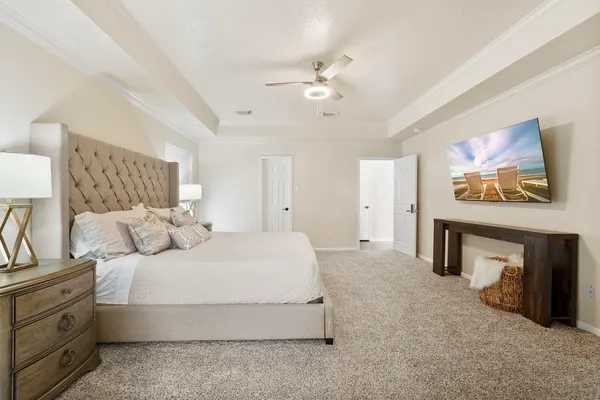 a bedroom with a bed and a fireplace