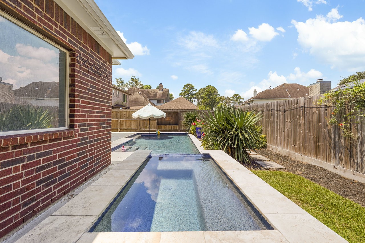 8615 Discus Drive Humble, TX 77346 - Photo 47 of 50 a view of balcony with wooden floor