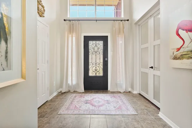 an entryway view with a front door
