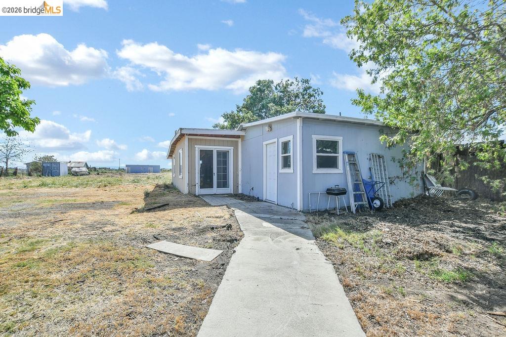 2191 East Cypress Road Oakley, CA 94561 - Photo 22 of 46 a view of a house with a yard