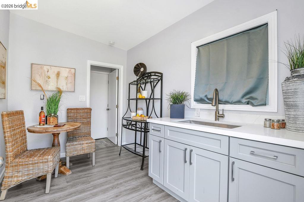 2191 East Cypress Road Oakley, CA 94561 - Photo 23 of 46 a en suite bathroom with a double vanity sink and a mirror