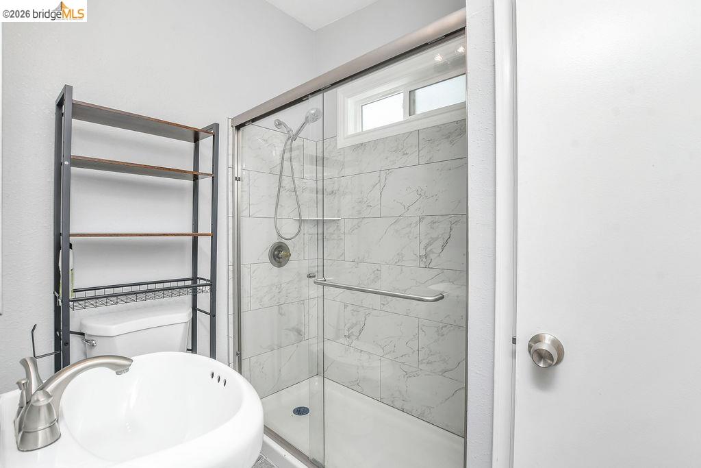 2191 East Cypress Road Oakley, CA 94561 - Photo 26 of 46 a bathroom with a sink and a mirror