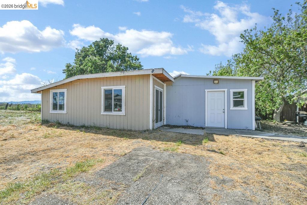 2191 East Cypress Road Oakley, CA 94561 - Photo 27 of 46 a view of a house with backyard and garden