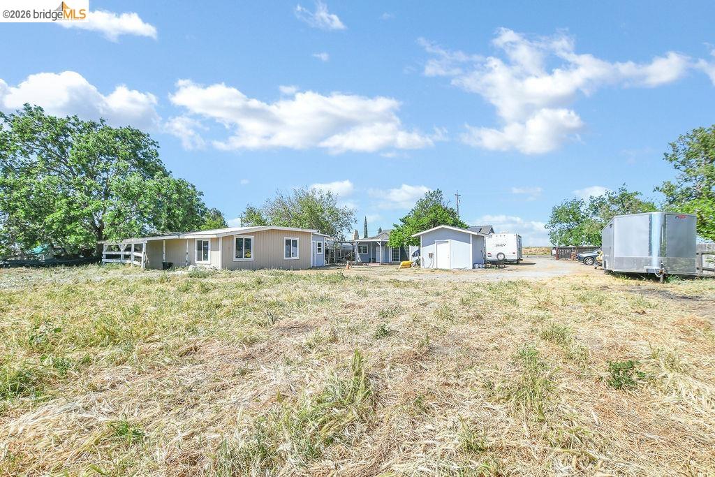 2191 East Cypress Road Oakley, CA 94561 - Photo 30 of 46 a front view of a house with a yard