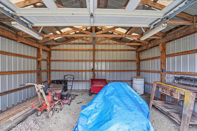 a view of a room with wooden walls