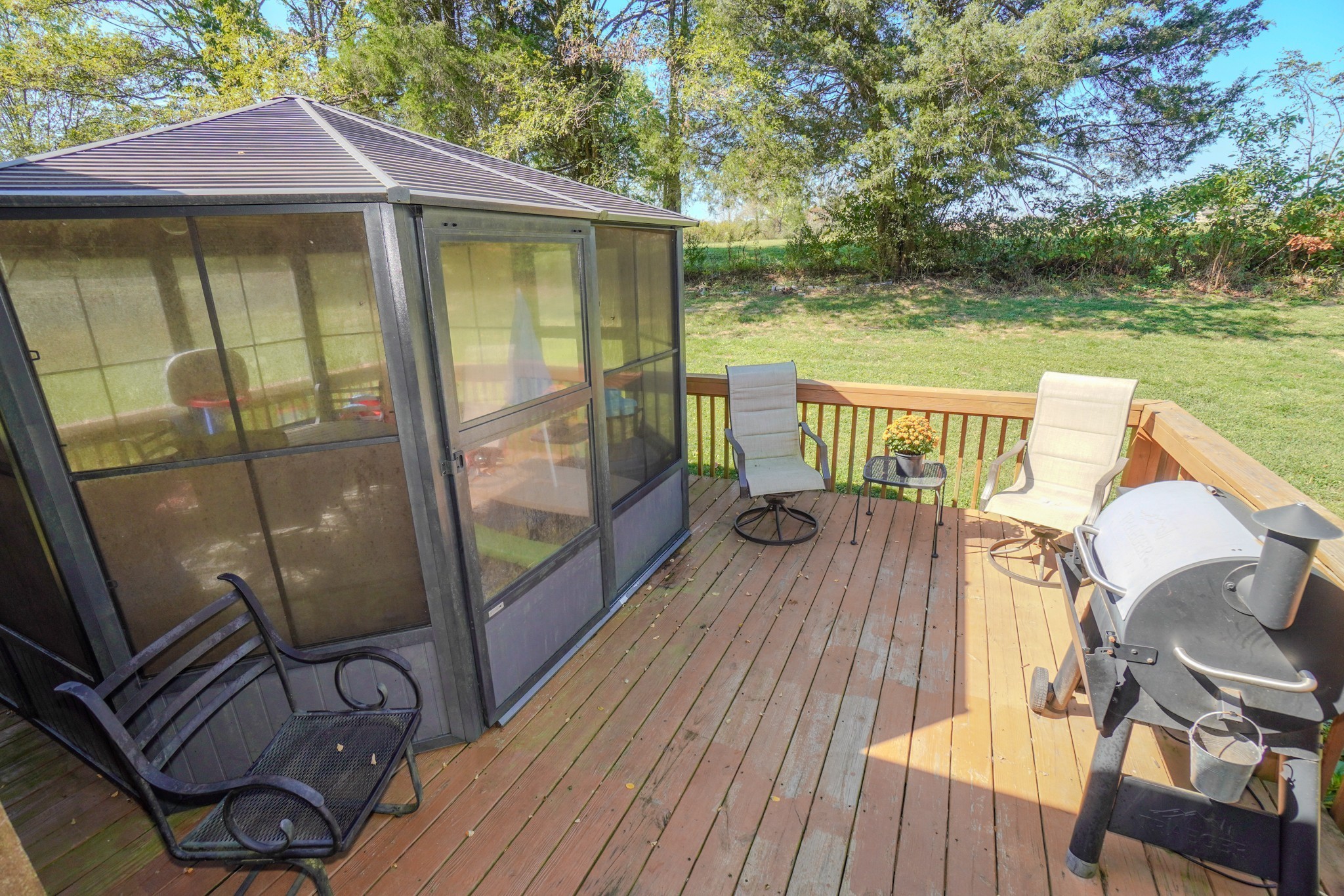 137 Hawkins Road Westmoreland, TN 37186 - Photo 20 of 71 a view of a deck with chairs next to a yard