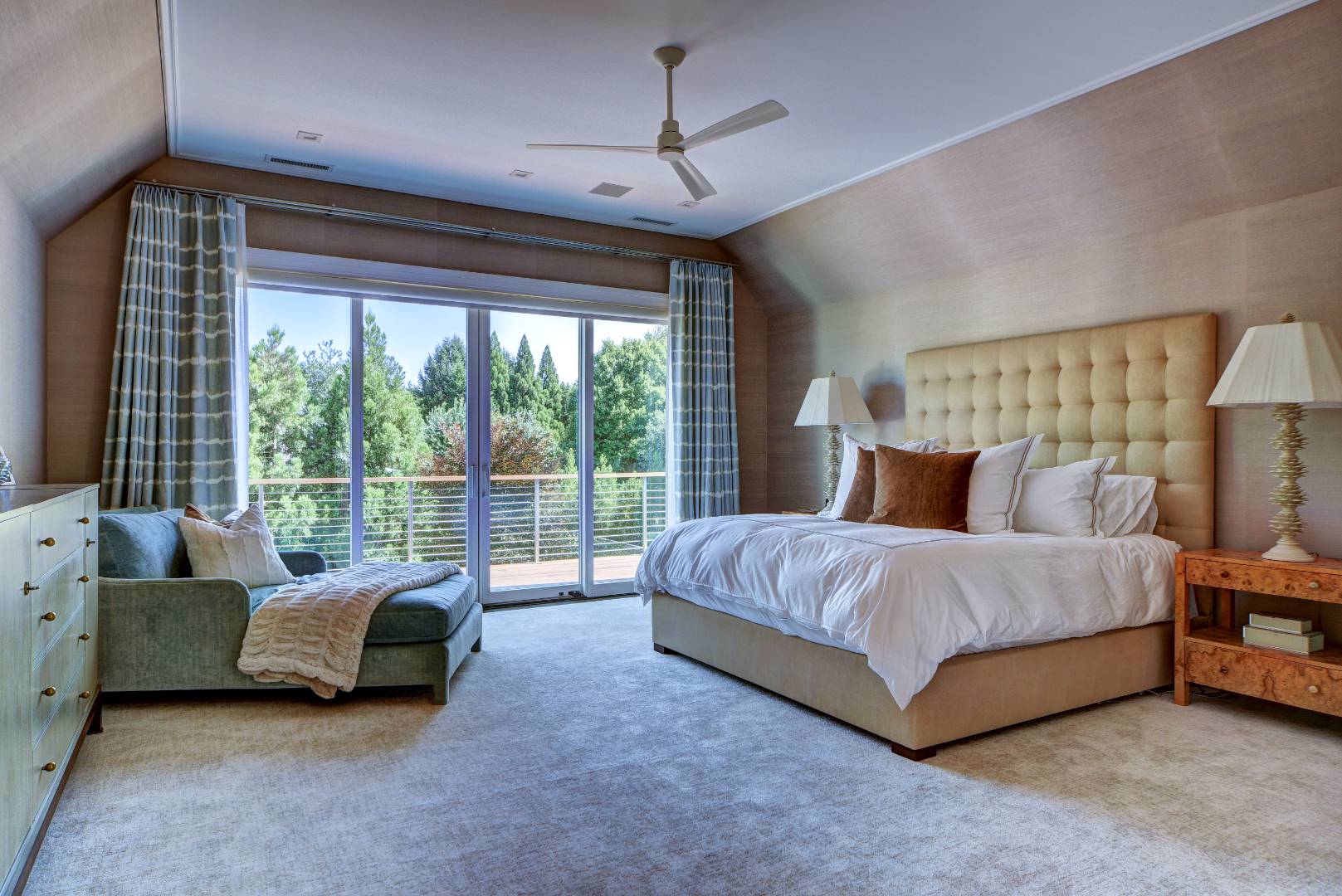 132 Long Lane East Hampton, NY 11937 - Photo 11 of 24 a spacious bedroom with a bed and a couch