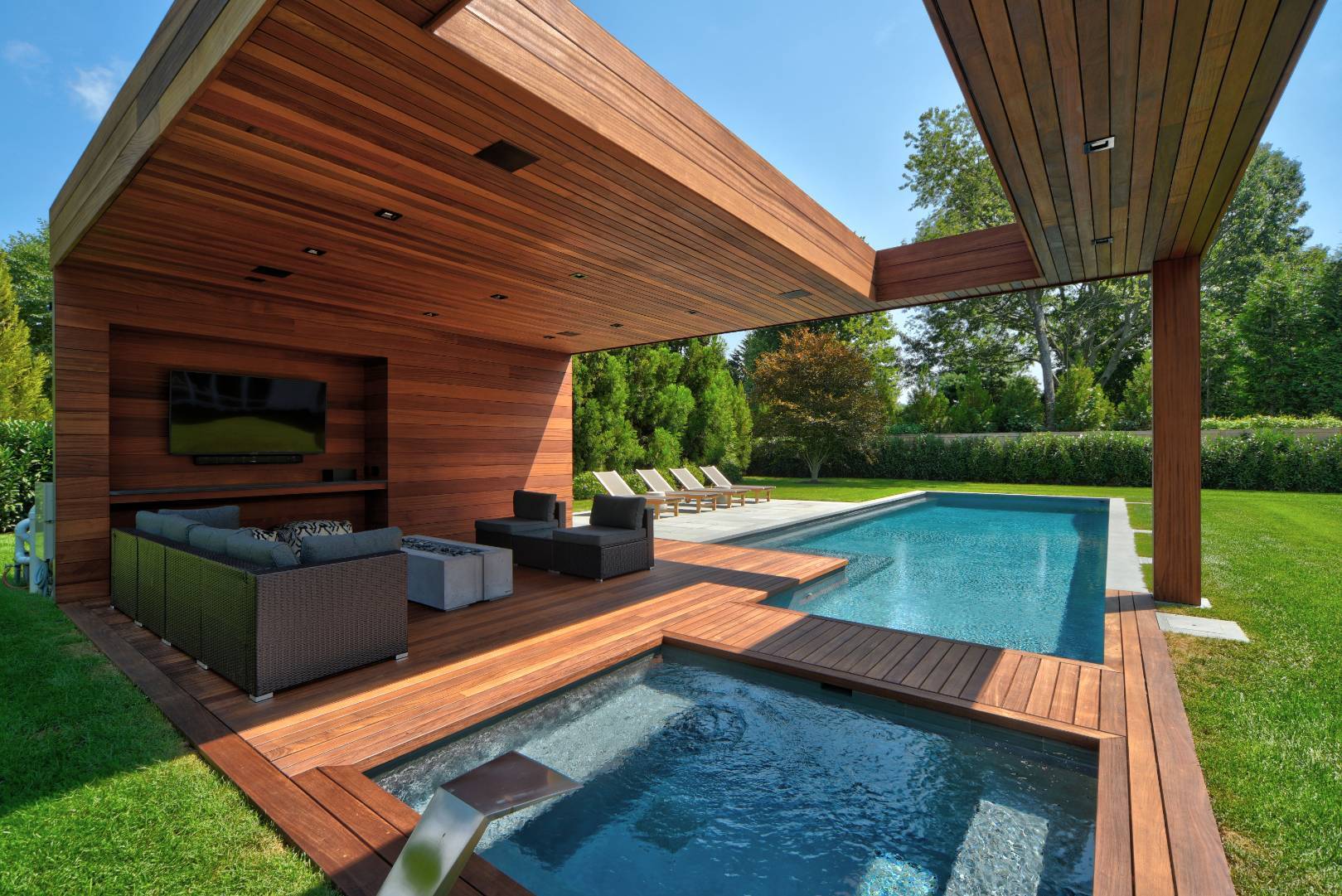 132 Long Lane East Hampton, NY 11937 - Photo 17 of 24 a view of a backyard with a patio