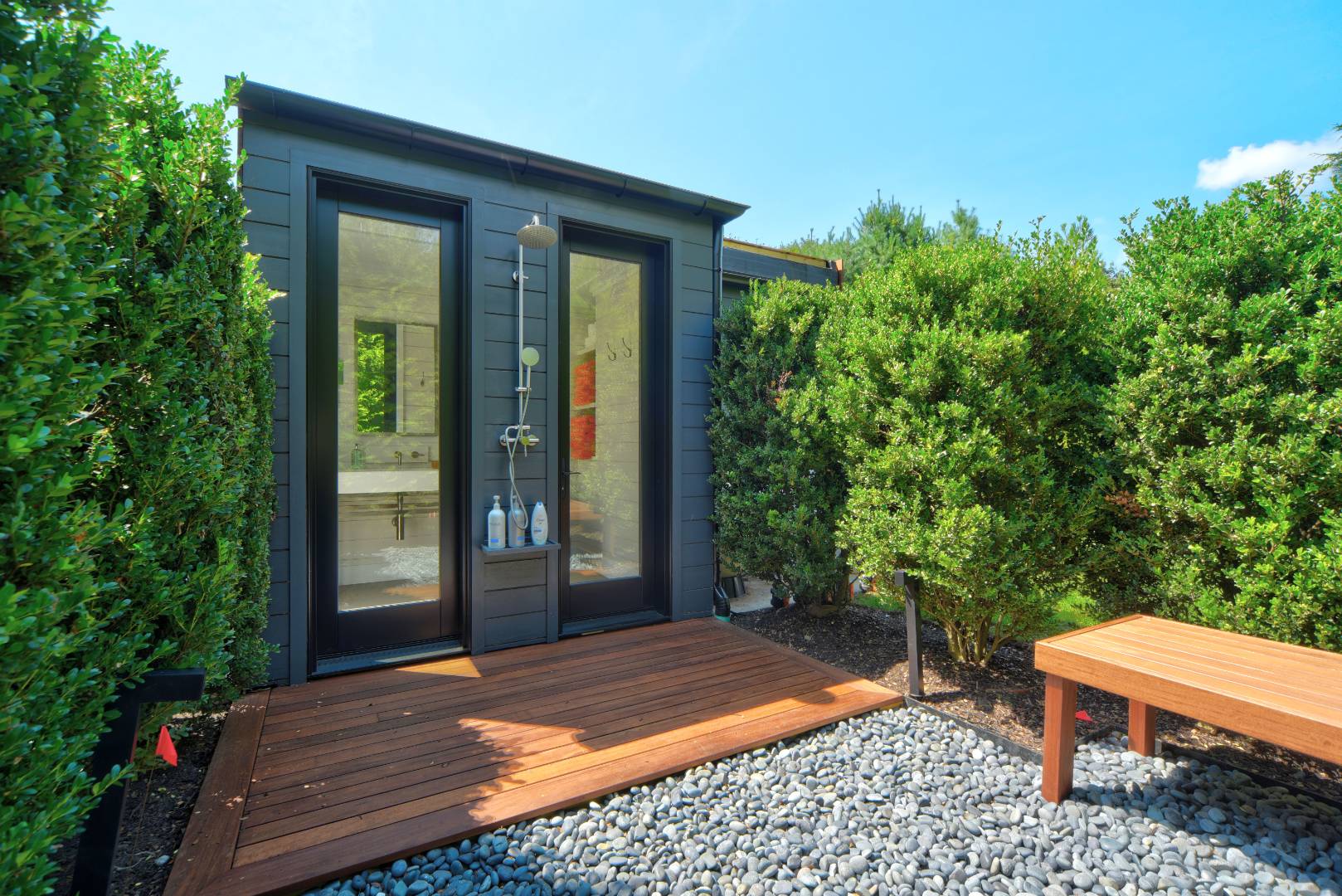 132 Long Lane East Hampton, NY 11937 - Photo 18 of 24 a view of a backyard with a patio