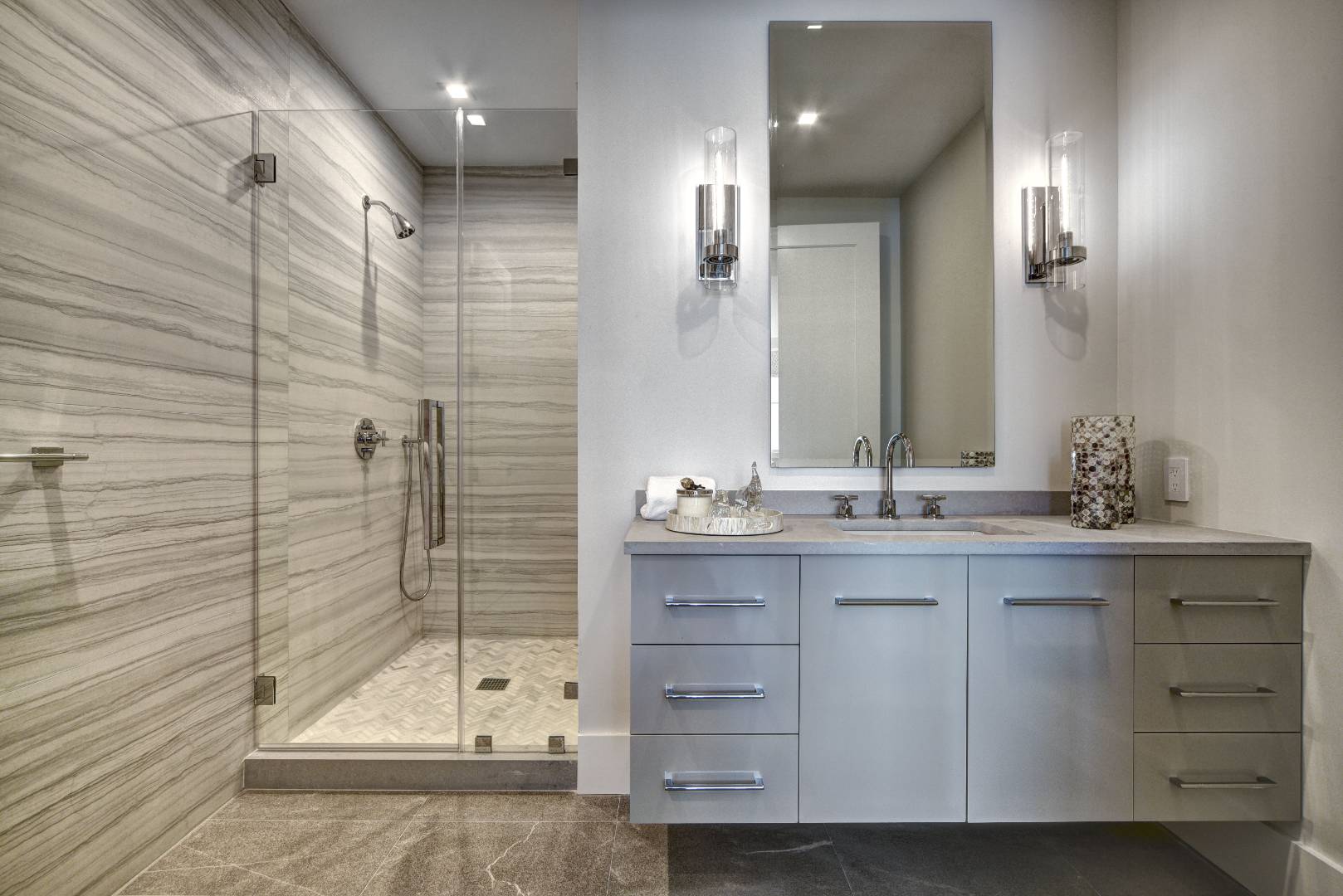 132 Long Lane East Hampton, NY 11937 - Photo 8 of 24 a bathroom with a granite countertop sink a mirror and shower