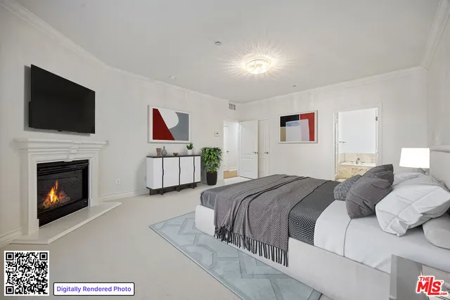 a bedroom with bed and a fireplace