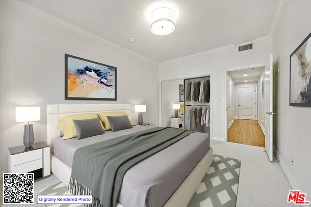 a bedroom with a bed and a lamp