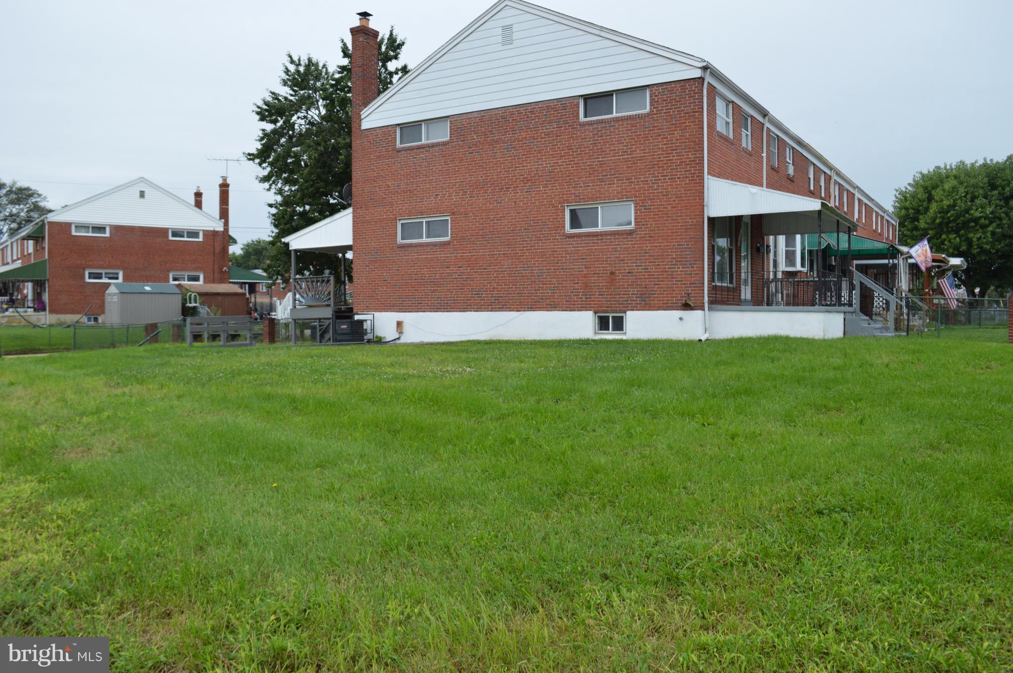 8223 Kavanagh Road Baltimore, MD 21222 - Photo 2 of 17 a view of house with backyard