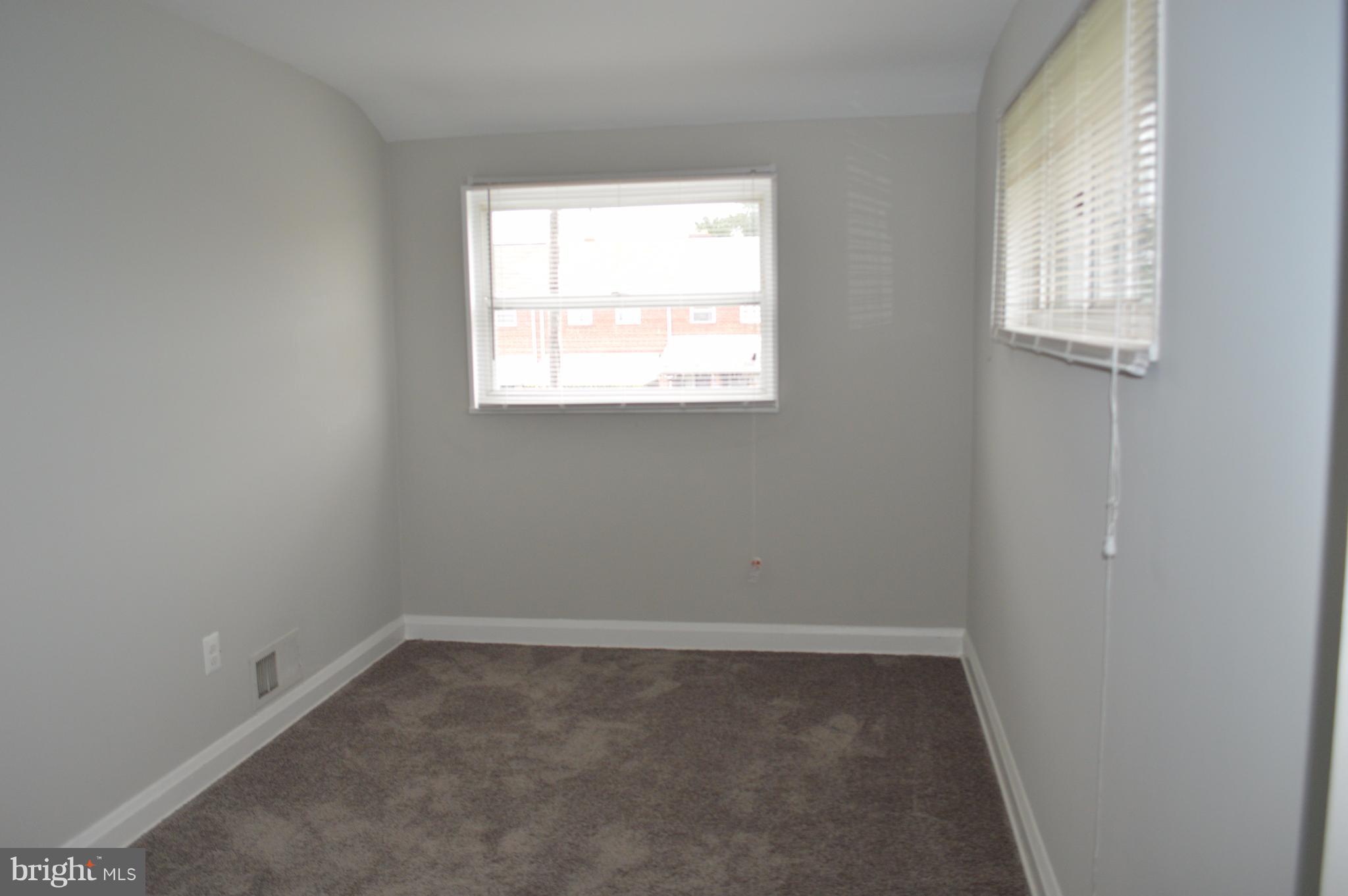 8223 Kavanagh Road Baltimore, MD 21222 - Photo 11 of 17 an empty room with a window