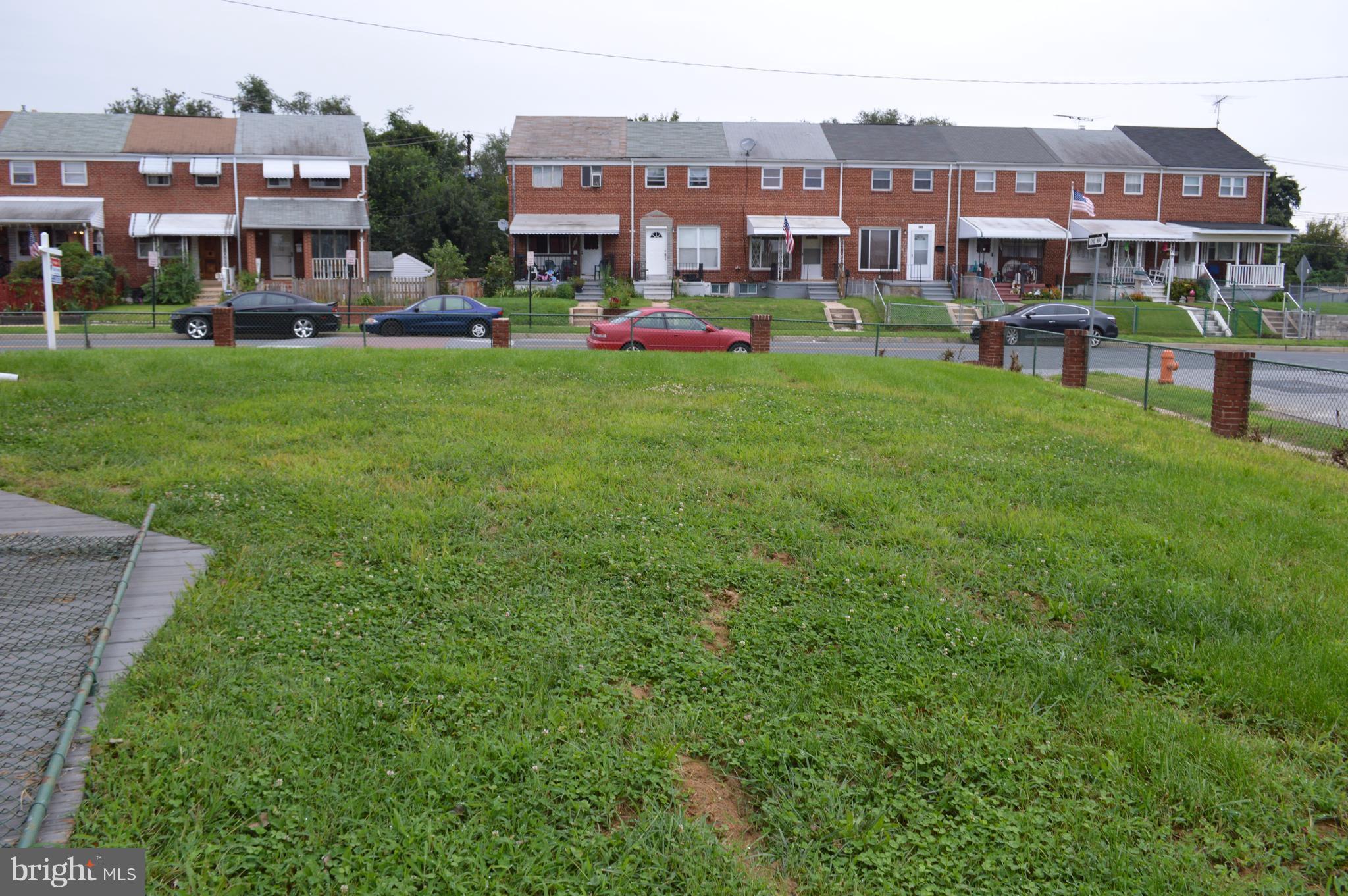 8223 Kavanagh Road Baltimore, MD 21222 - Photo 3 of 17 a view of a city with tall buildings and a big yard