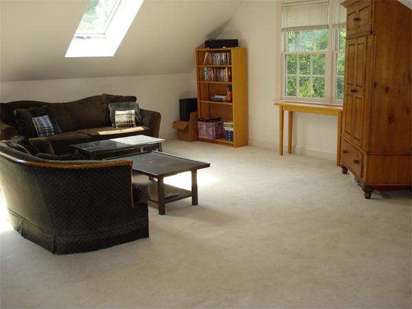 50 Deerpath Road Dedham, MA 02026 - Photo 11 of 13 a living room with furniture and a window
