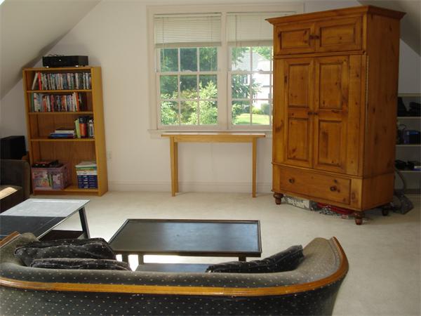 50 Deerpath Road Dedham, MA 02026 - Photo 12 of 13 a living room with fireplace furniture and a window