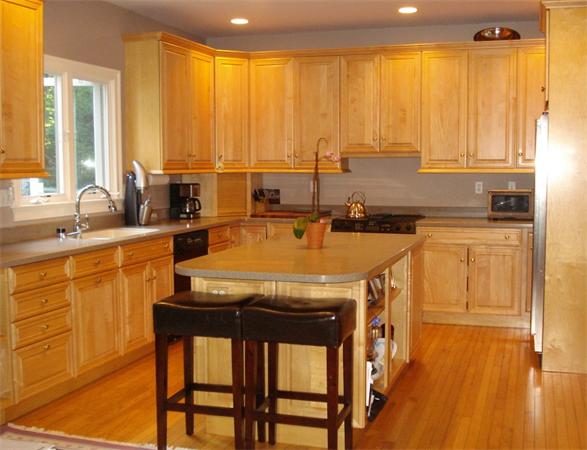 50 Deerpath Road Dedham, MA 02026 - Photo 4 of 13 a kitchen with a sink a window and cabinets