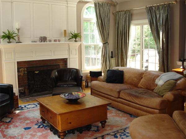 50 Deerpath Road Dedham, MA 02026 - Photo 7 of 13 a living room with furniture and a fireplace