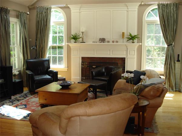 50 Deerpath Road Dedham, MA 02026 - Photo 8 of 13 a living room with furniture and a fireplace
