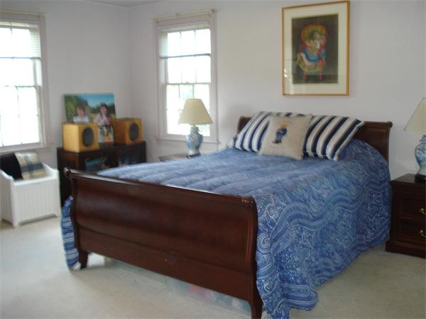 50 Deerpath Road Dedham, MA 02026 - Photo 10 of 13 a bedroom with a bed and window