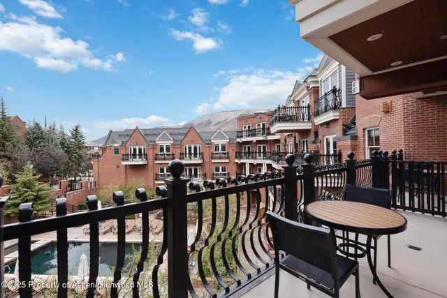 a view of a balcony dining area