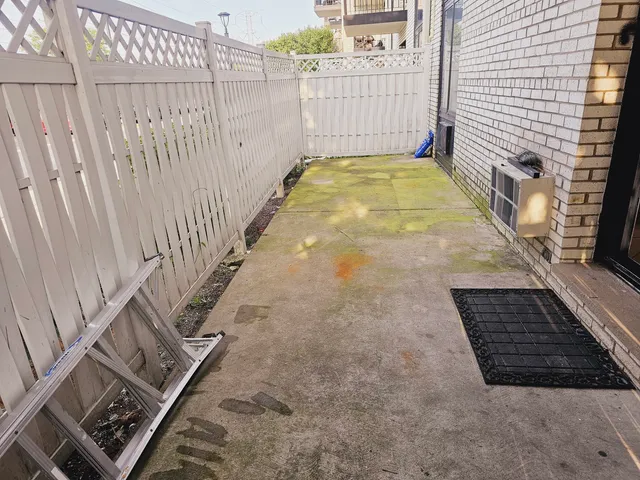 a view of balcony with wooden floor