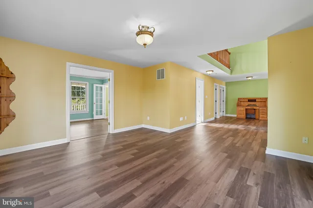 a view of a kitchen with furniture and a fireplace