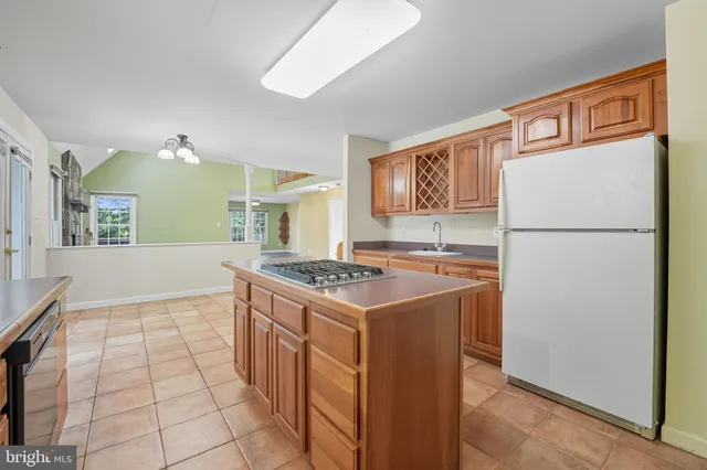 a utility room with a sink dryer and washer