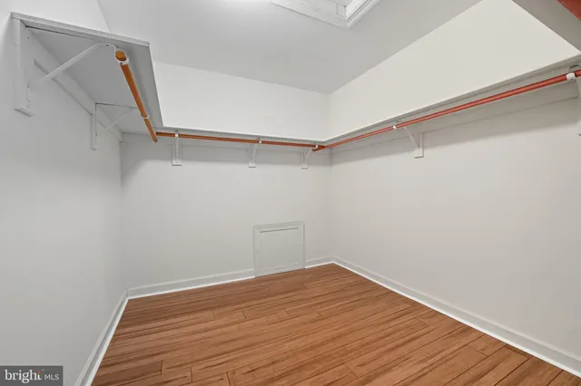 a view of a room with wooden walls