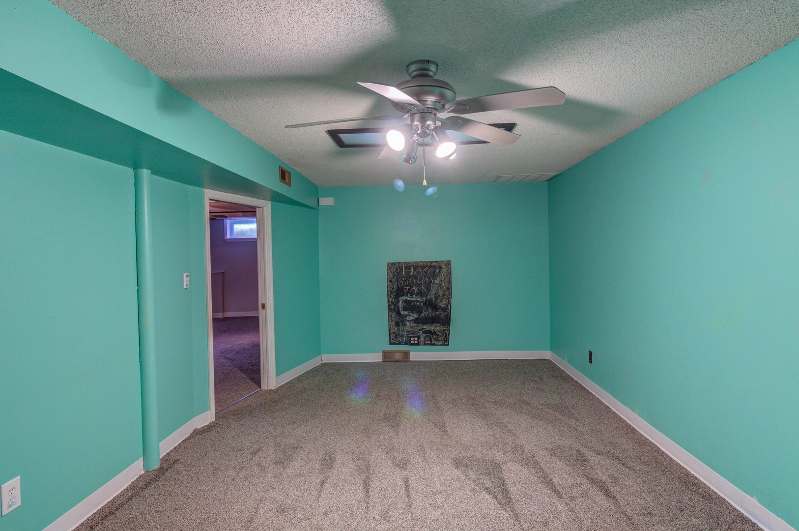 1201 Eastern Drive Urbana, IL 61801 - Photo 23 of 30 a view of an empty room with a fan